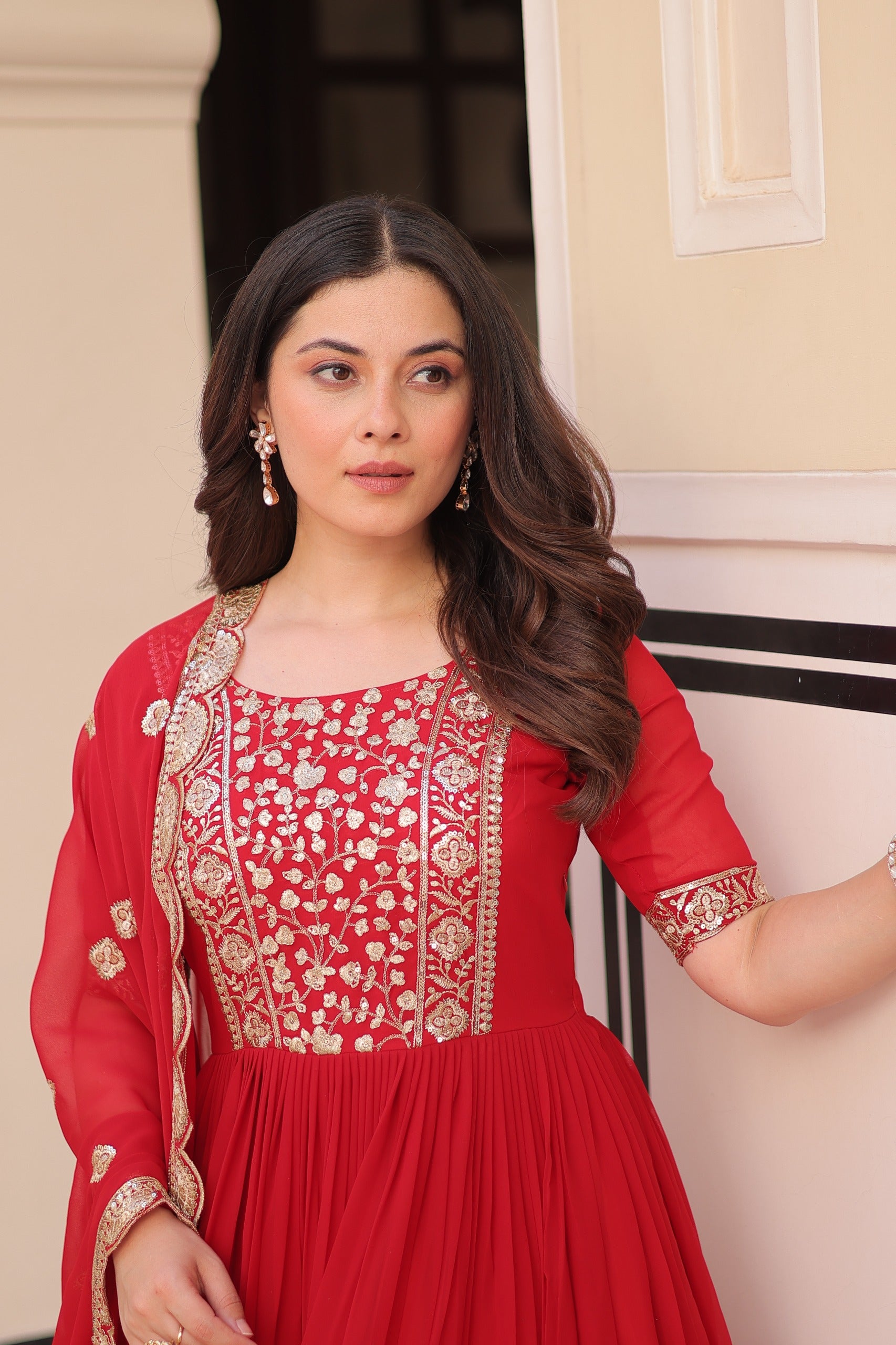 Red embroidered gown with dupatta stitched