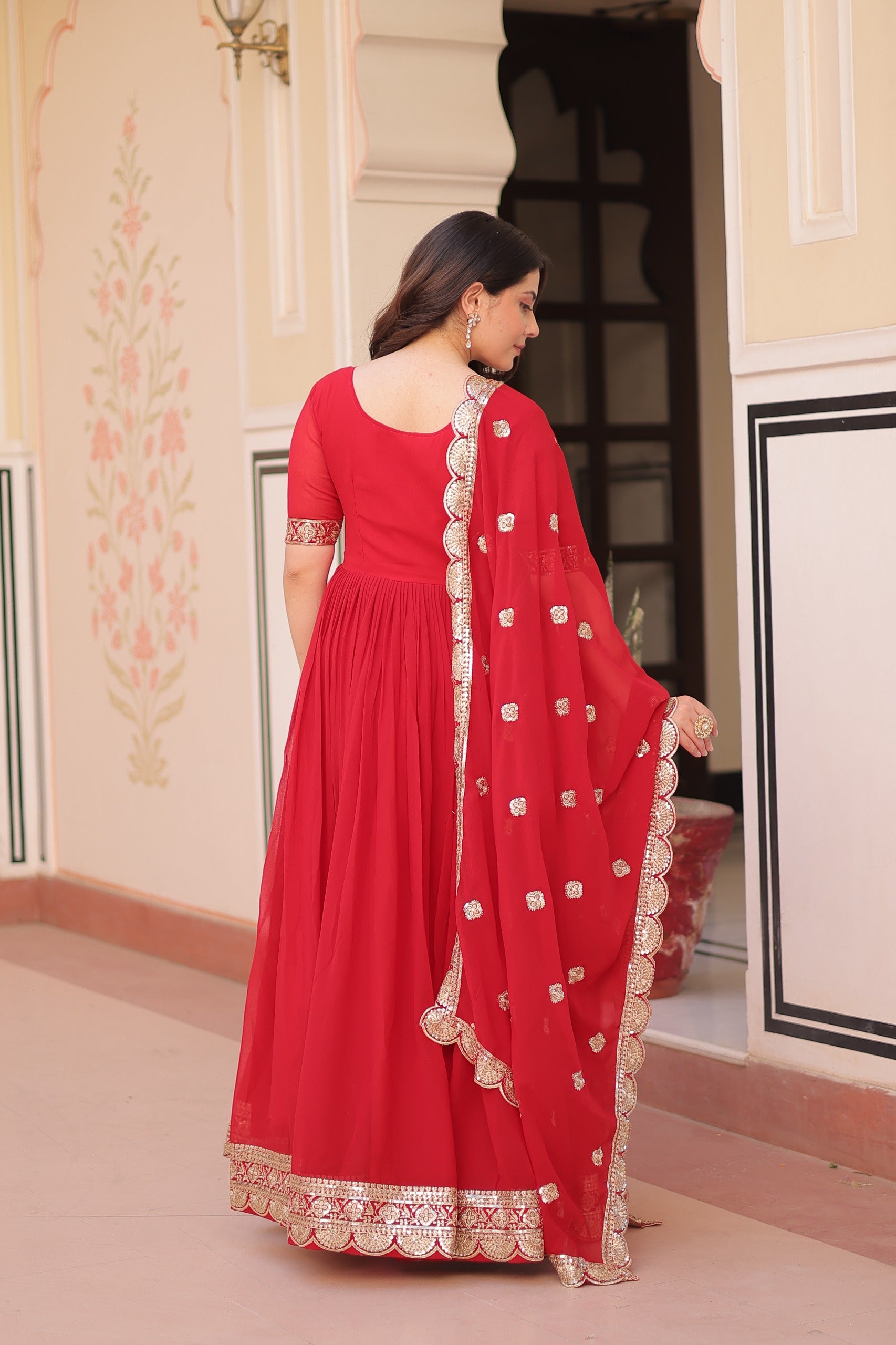 Red embroidered gown with dupatta stitched