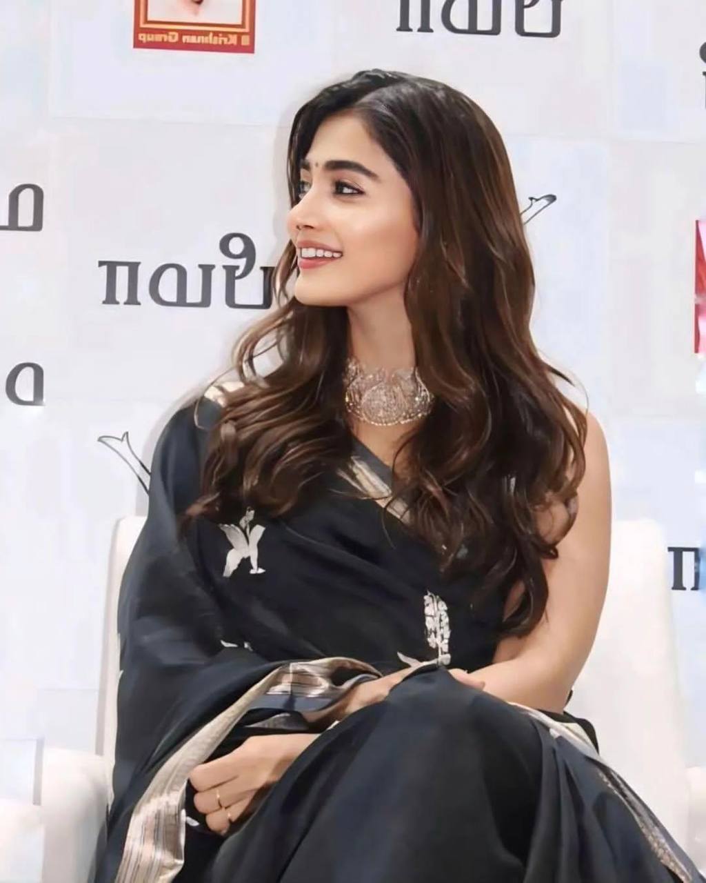 Black Silk Saree with Silver Zari Border and Floral Motif