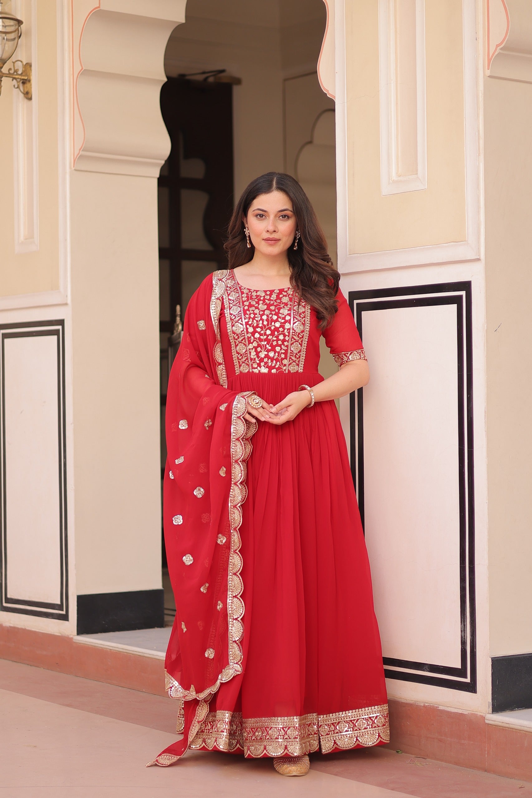 Red embroidered gown with dupatta stitched