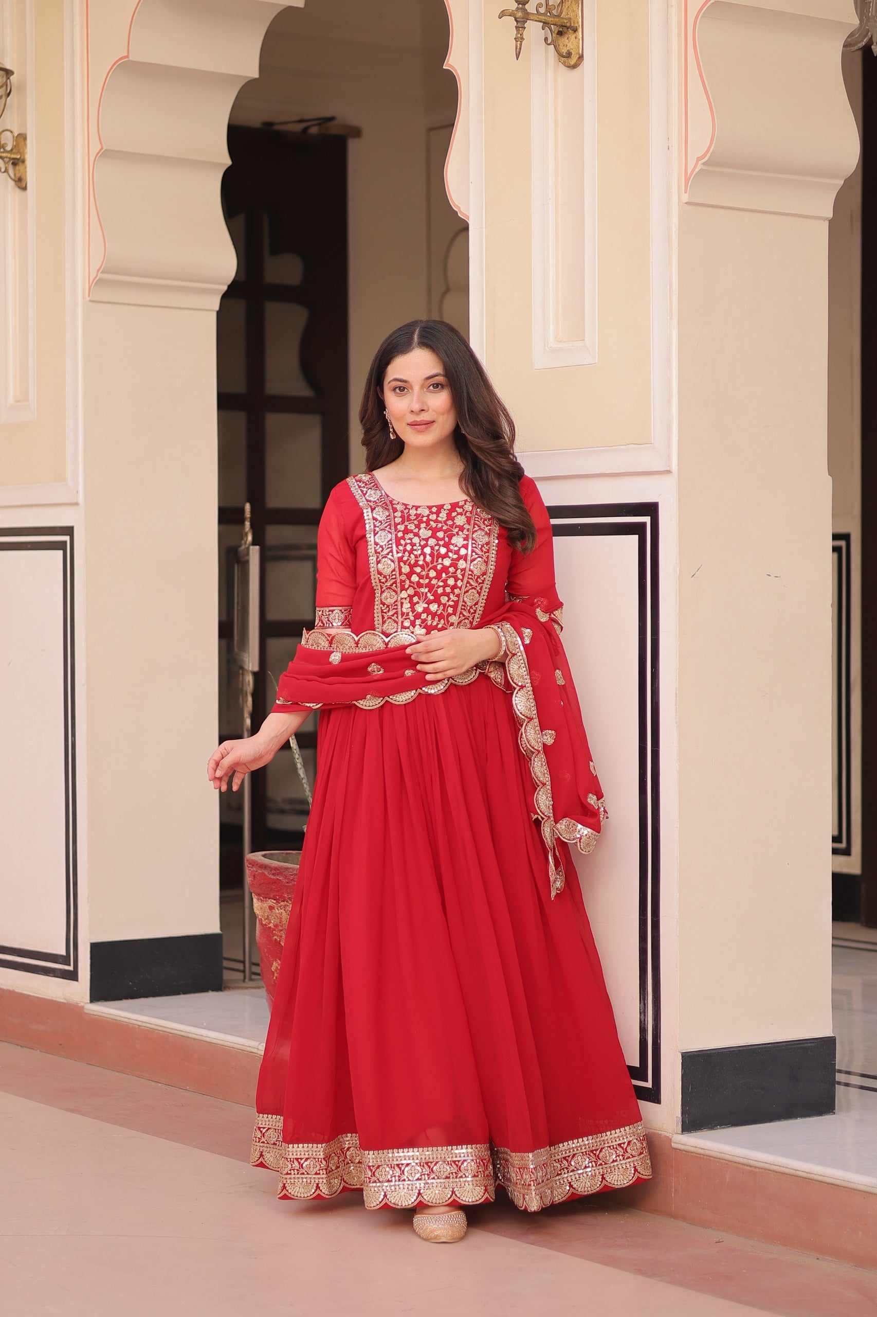 Red embroidered gown with dupatta stitched